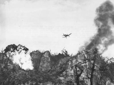 Corsair Blast Japanese Position at Five Sisters Peaks Peleliu
