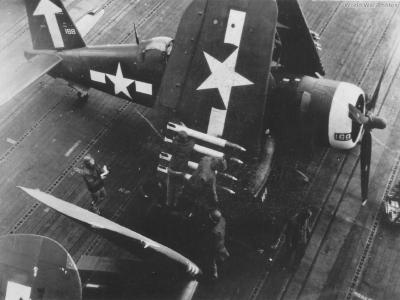 F4U-1D 168 of VF-84 being armed with rockets