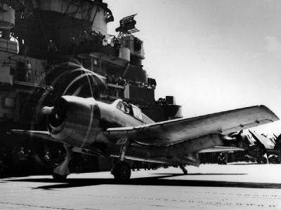 F6F-3 Hellcat #27 of VF-7 before launching from the flight deck of the carrier USS Hancock (CV-19) – June 27, 1944