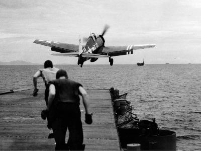 F6F-5 Hellcat D10 of VF-40 launches from the flight deck of the escort carrier Suwanee (CVE-27) August 30, 1945