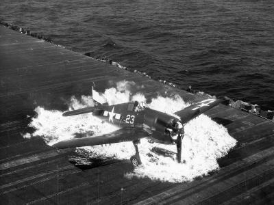 Burning F6F-5 Hellcat white 23 from VF-9 USS Lexington (CV-16) 25 February 1945