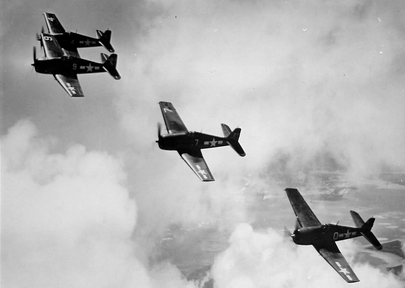 Formation of F6F-3 Hellcats of VF-1 in flight over Hawaii May 1944
