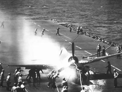 Burning F6F-3 BuNo 66101 of VF-25 USS Cowpens