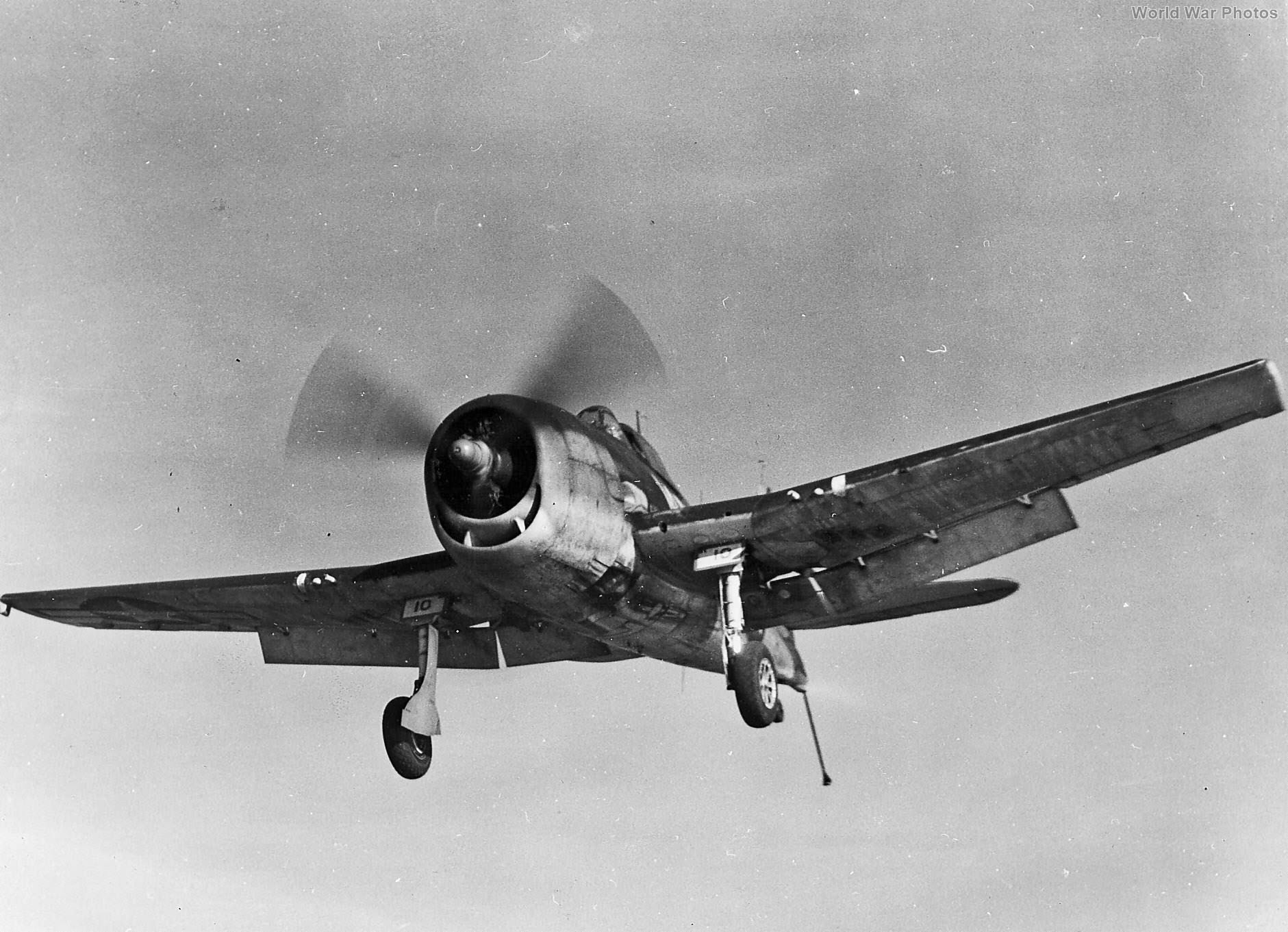 F6F-3 of VF-15 approach for recovery on board the USS Charger December 1943
