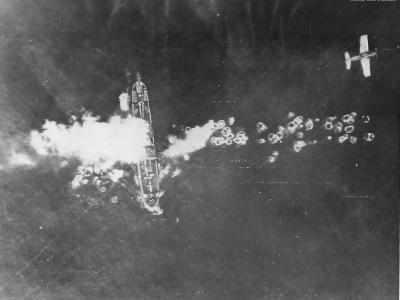 F6F of 3rd Fleet strafes Japanese freighter near Fukuya Wan 45