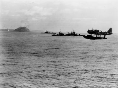 OS2U flies low over the water of Iwo Jima 19 February 1945