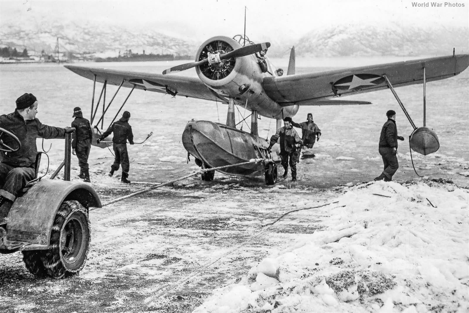Tractor pulls OS2U FAW 4 onto Alaskian shore 8jan43