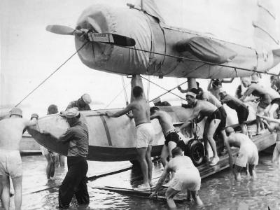 U.S. Sailors with OS2U in South Pacific 1942