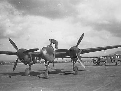 F-5 Recon Lightning by Ambulance on Airfield