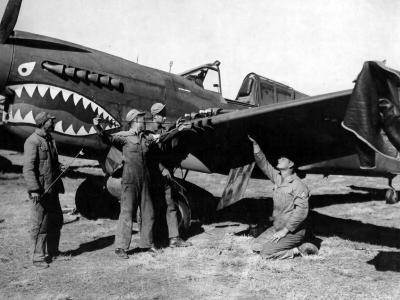 74th Fighter Squadron 23rd Fighter Group Check The Guns On A Curtiss P-40 At Kunming China