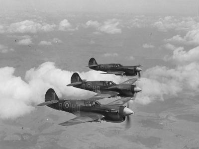 Curtiss P-40 Kittyhawk of the 14 Sqn RNZAF in flight July 1943