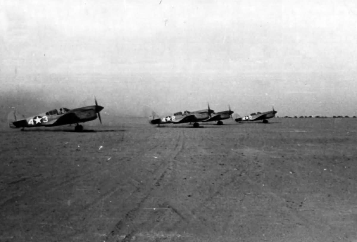 P-40 Warhawks Taxi Up To The Take Off Line At An Airbase Near Burg El Arab Somewhere In North Africa