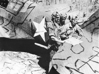 49th FG pilots checking map Australia 1942