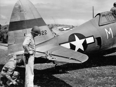 Damaged P-47 43-25322 “Super Paduzi” of the 19th Fighter Squadron, 318th Fighter Group Saipan