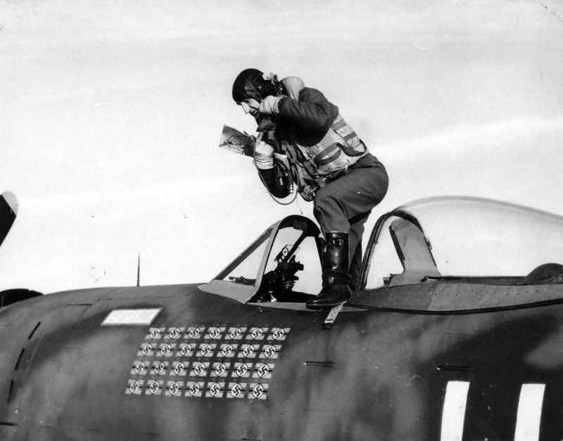 Lt. Col. Francis S. ‚Gabby’ Gabreski of the 61st Fighter Squadron, 56th Fighter Group climbs out of a P-47 Thunderbolt Bubbletop cockpit