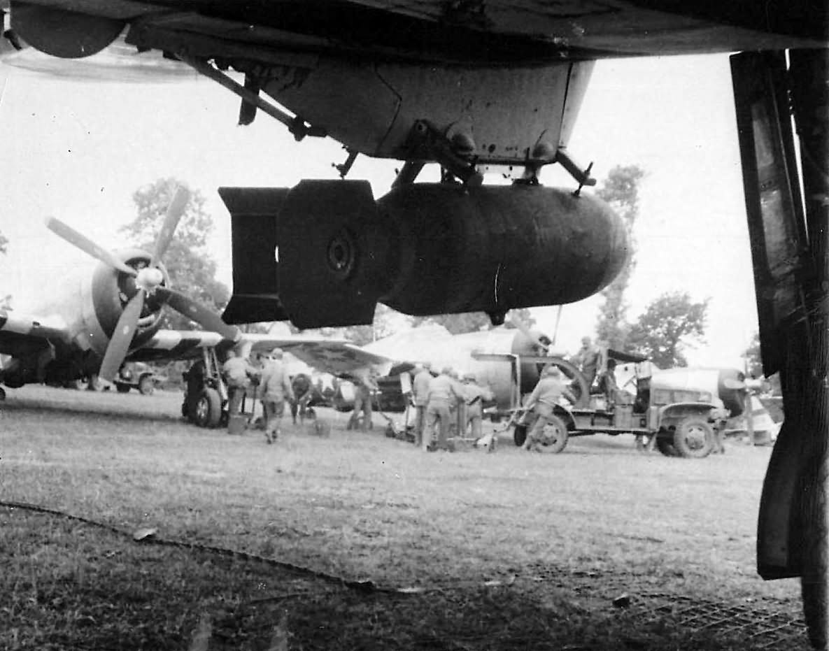 Bomb Hangs from USAAF P-47 Thunderbolt in Normandy France 1944