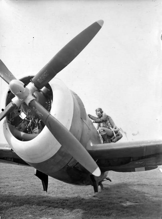 Pilot of the 56th Fighter Group climbs into the cockpit of his P-47 Thunderbolt – April 1943