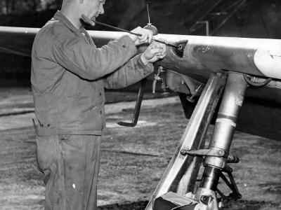 Armorer Cleans The 0,50 Caliber Machine Guns of the P-51B