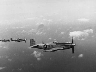 P-51 Mustangs in Flight over Pacific
