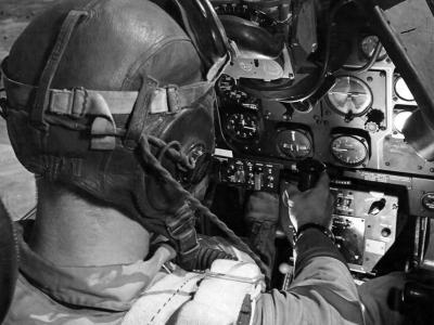 Pilot of a North American P-51 Mustang in cockpit