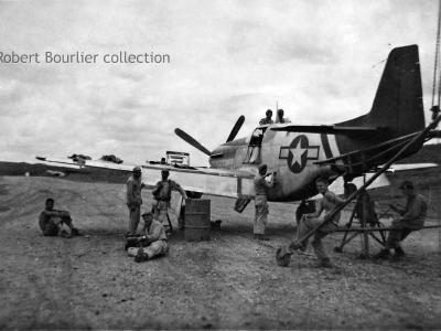 Harmonizing guns on a P-51C from 75th FS, 23rd FG