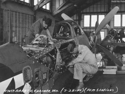Mechanics working on a P-63 Ephrata, WA July 1944 3