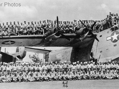 Members of VPB-15 demonstrate the strength of the PB2Y-5’s wings