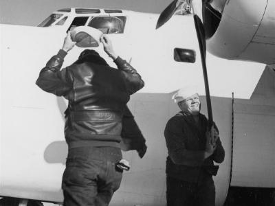 Ground crew rotating the propeller of the PB4Y-1 at NAS Norfolk