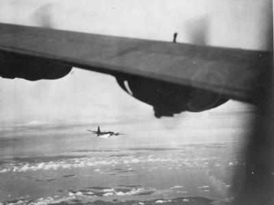 Burning Privateer of VPB-106 over Singapore June 1945