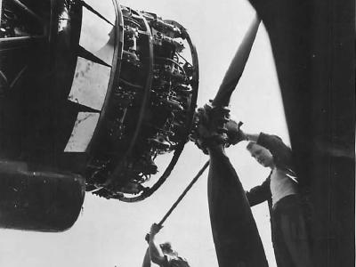 Crew installs new propeller on PBM at Marianas base