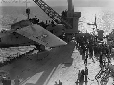 Early PBM-1 55-P-1 of the VP55 being hoisted on board the seaplane tender, 1941 2