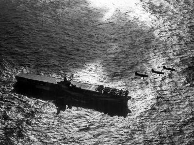 SB2C Helldivers in flight over USS Ranger (CV-4) on April 12, 1945