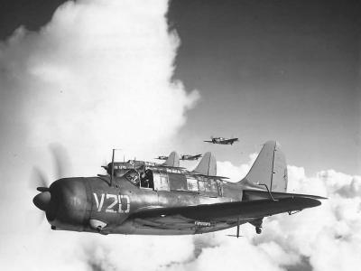 Curtiss SB2C-3E Helldivers flying in formation
