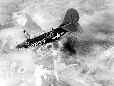 SB2C-3 Helldiver 82-B-33 of VB-82 after going over the side of the carrier USS Charger during training operations off the East Coast on 21 June 1944