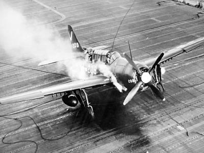 SB2C-4E Helldiver #209 of VB-87 strikes the barricade – USS Ticonderoga