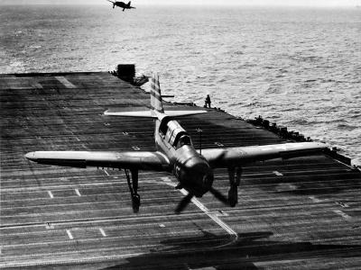 SB2C-4 Helldiver of VB-12 coming in high during a recovery on board USS Randolph (CV-15) in 1945