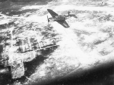 Curtiss SB2C from USS Franklin (CV-13) flying over Palau Island 1944