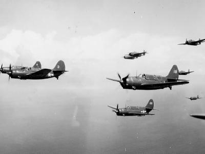 SB2C of VB-87 and TBM of VT-87 operating off the carrier USS Randolph in flight off the coast of Venezuela on December 4, 1944