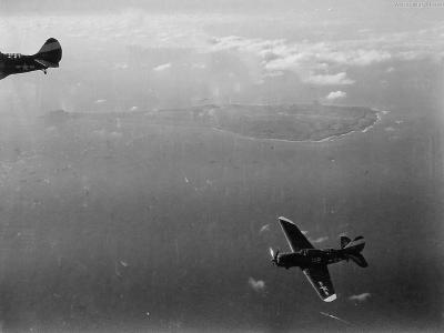 SB2Cs over Iwo Jima on D-Day