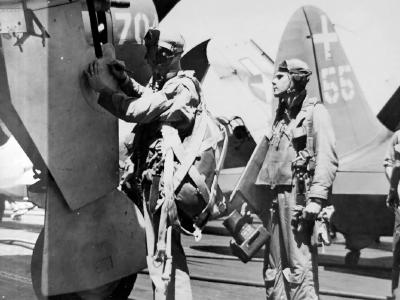 VB-18 pilot makes final naviagation notes – USS Intrepid (CV-11)