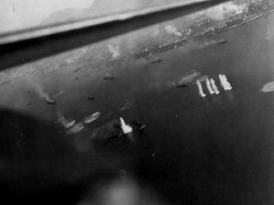 Ships in the harbor at Hong Kong under attack by Helldivers of VB-11 USS Hornet (CV-12 on 16 January 1945