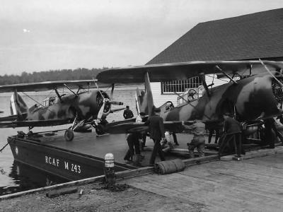 RCAF mechanics load SBC-4 Helldivers onto barges at Dartmouth 1940