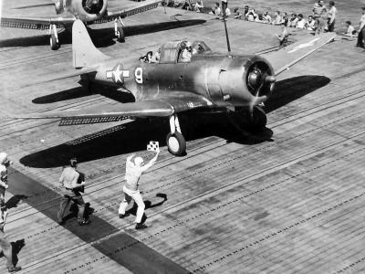 SBD-5 Dauntless white 9 prepare to take off from aircraft carrier