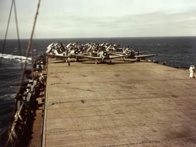 SBD Dauntless, F6F and TBF on the flight deck of the aircraft carrier 1943 – color photo