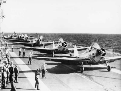 Devastators of VT-3 preparing to take off from the flight deck of USS Saratoga