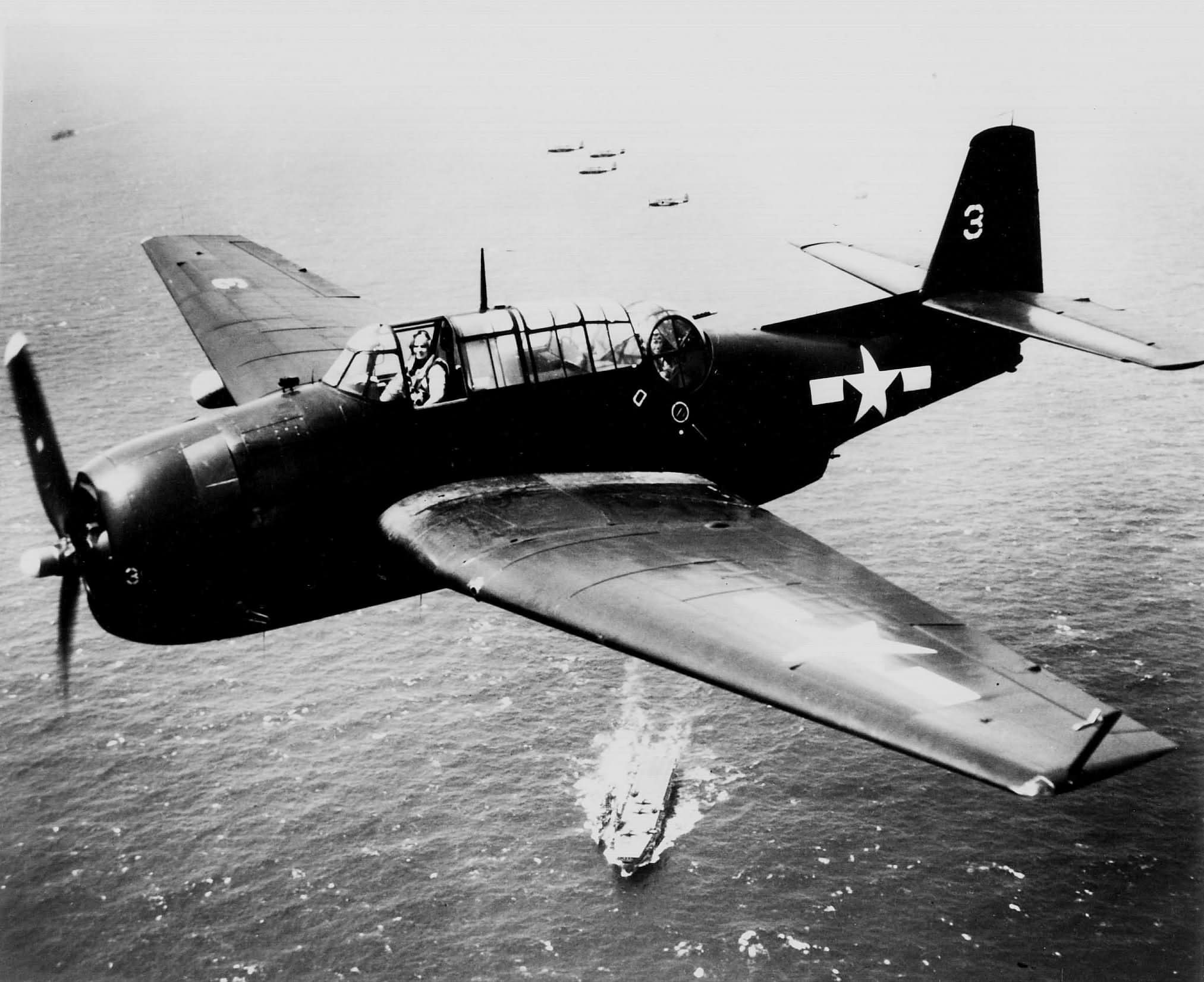TBM-3E Avenger #3 of VT-33 in flight over USS Sangamon March 2,7 1945