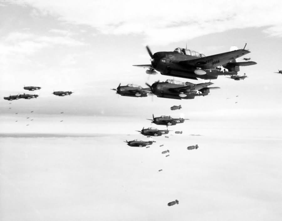 TBM Avengers and SB2C Helldivers of CAG-83 off the carrier USS Essex over Japan on July 15, 1945