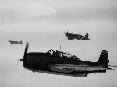 Grumman TBM Avenger of VT-4 off the carrier USS Essex (CV-9) en route to attack Formosa with an escort of F4U Corsairs of VMF-124 and 213 on January 3, 1945