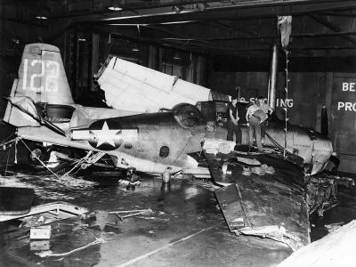 Destroyed TBM Avenger #122 on the hangar deck of the USS Monterey December 19, 1944