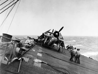 TBF Avenger 22 on deck of carrier USS Anzio CVE-57 during a typhoon east of the Philippines 17 December 1944